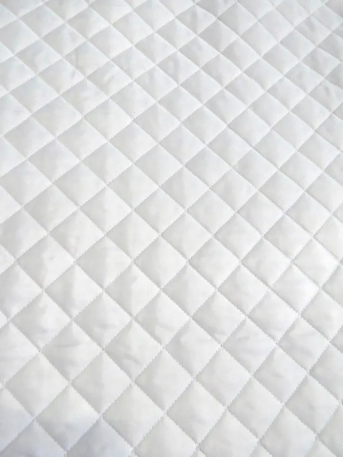 Quilted Polyester Batting Upholstery Fabric / White / Sold By The Yard